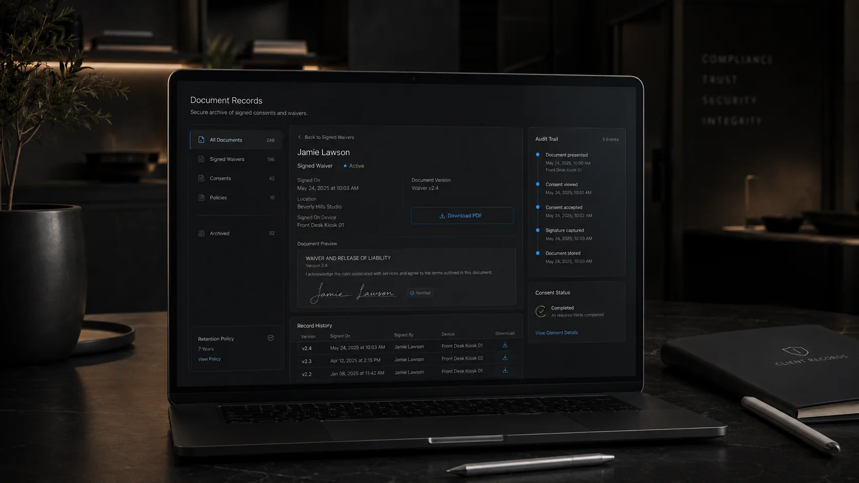Document records dashboard on a laptop showing waiver history and an audit trail